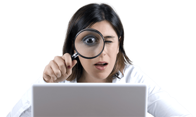 Women Looking at computer with magnifying glass