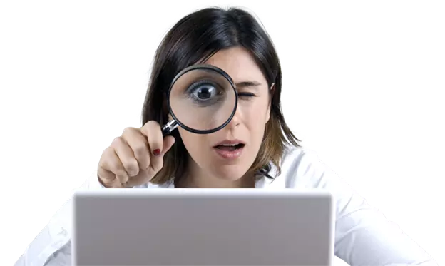 Women Looking at computer with magnifying glass